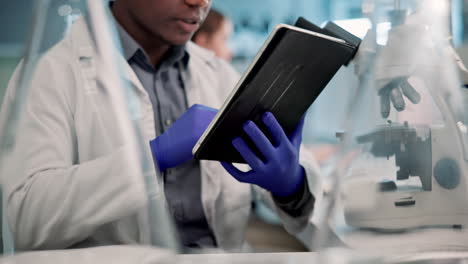 scientist using tablet in lab