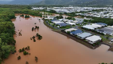 flooding from cattana wetlands close to houses caused by cyclone jasper in trinity park, cairns