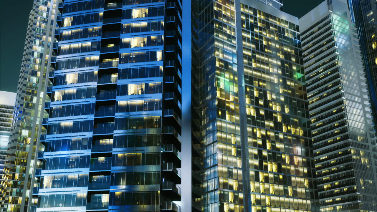 Nighttime cityscape showcasing illuminated skyscrapers in a bustling metropolis