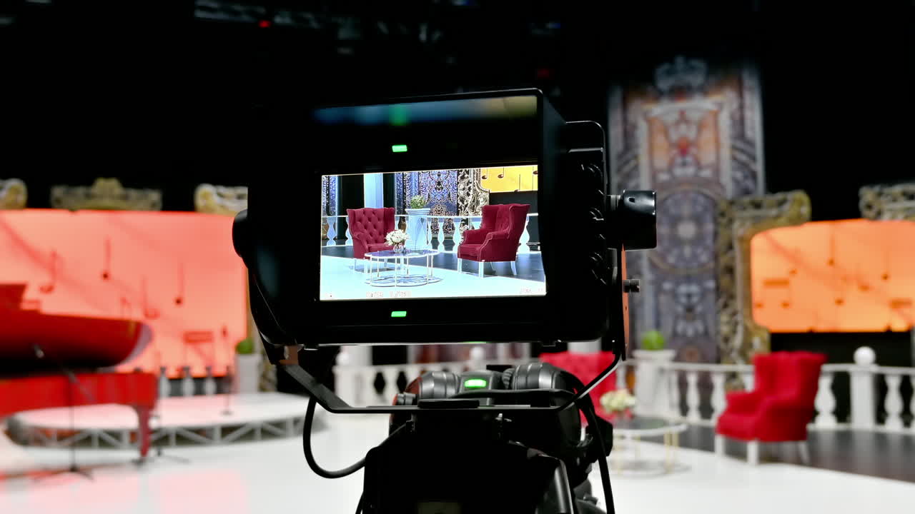 Professional camera filming on the backstage of a TV set