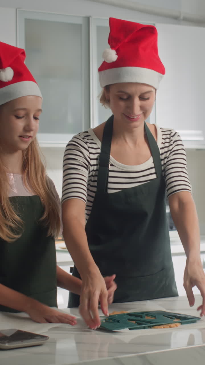 Daughter and Mom Cooking Gingerbread for Christmas