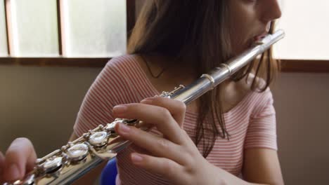 teenage musicians rehearsing