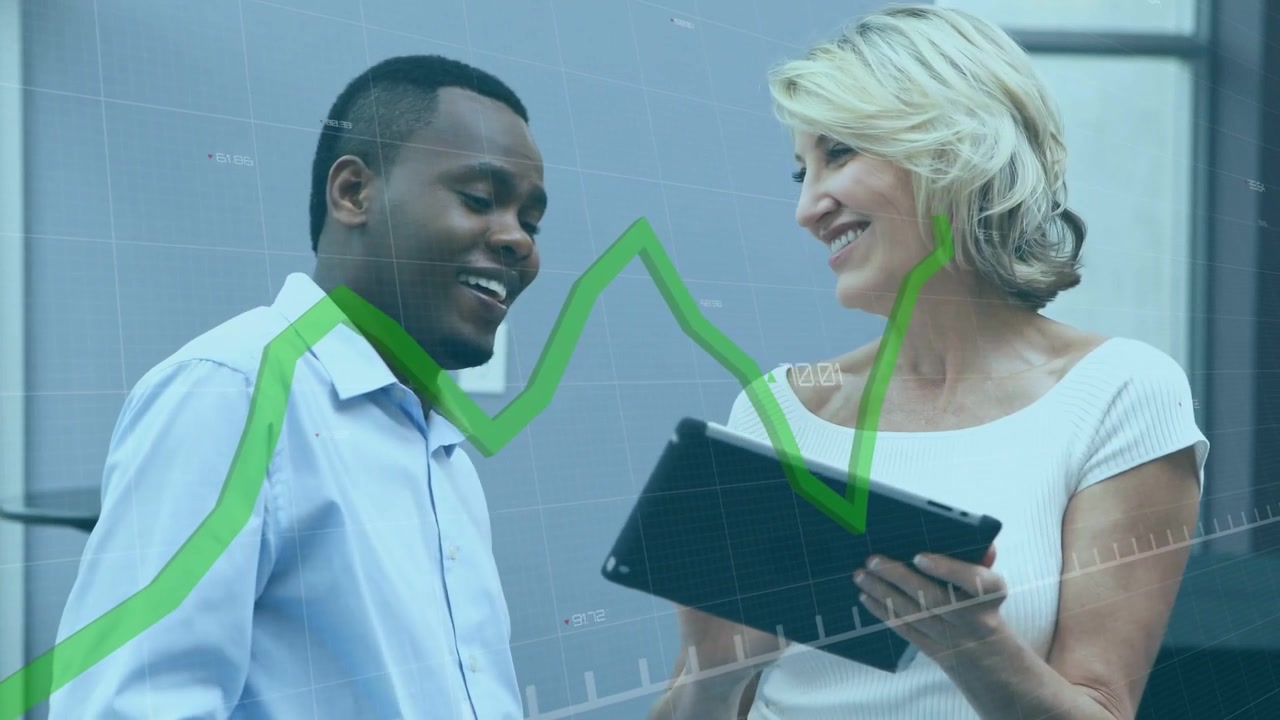 Business team in office woman tapping tablet man pointing green graph overlay screen analyzing data