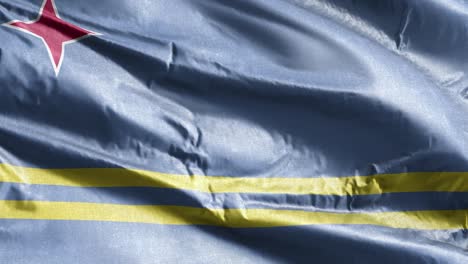 aruba textile flag slow waving on the wind loop. aruba banner smoothly swaying on the breeze. fabric textile tissue. full filling background. 20 seconds loop.