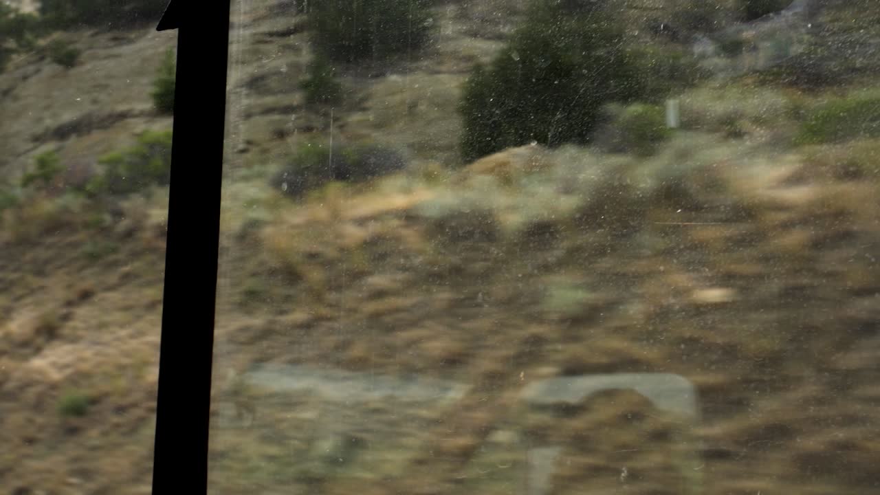 POV of driving through Wyoming's terrain