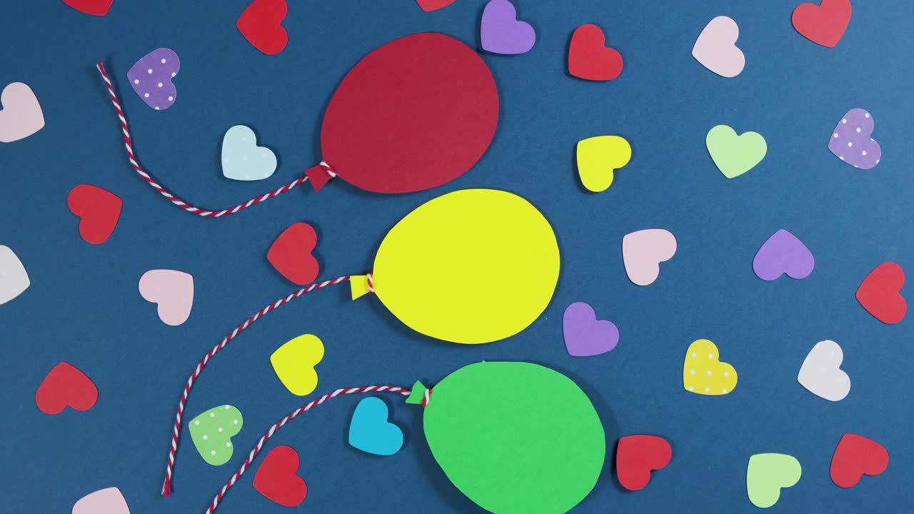 Spinning of Valentine's Day background. Holiday Valentine Background with multicolored paper Hearts and balloons. 4K Video Footage. Love concept.