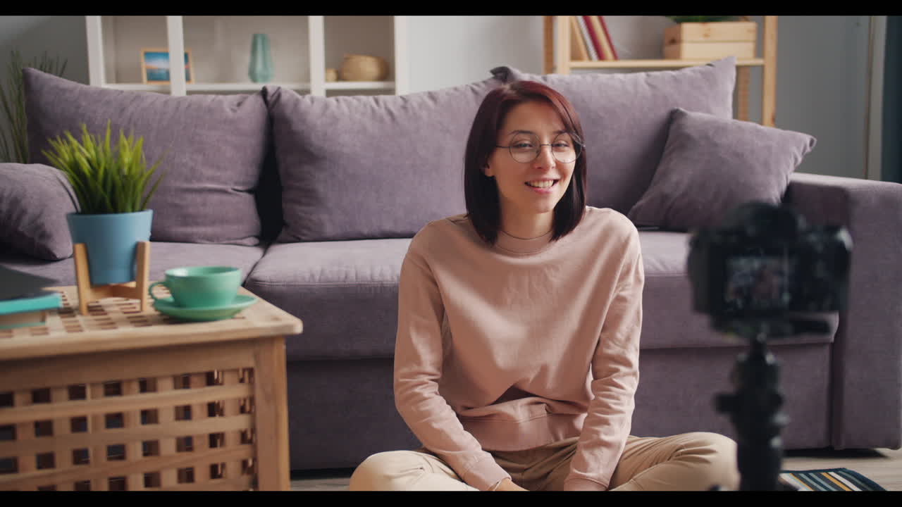 Woman creating video content at home