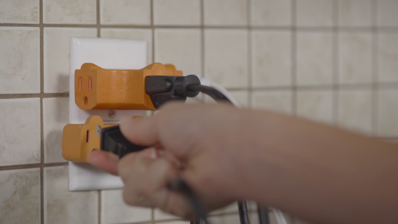 An outlet is fitted with two plug splitters