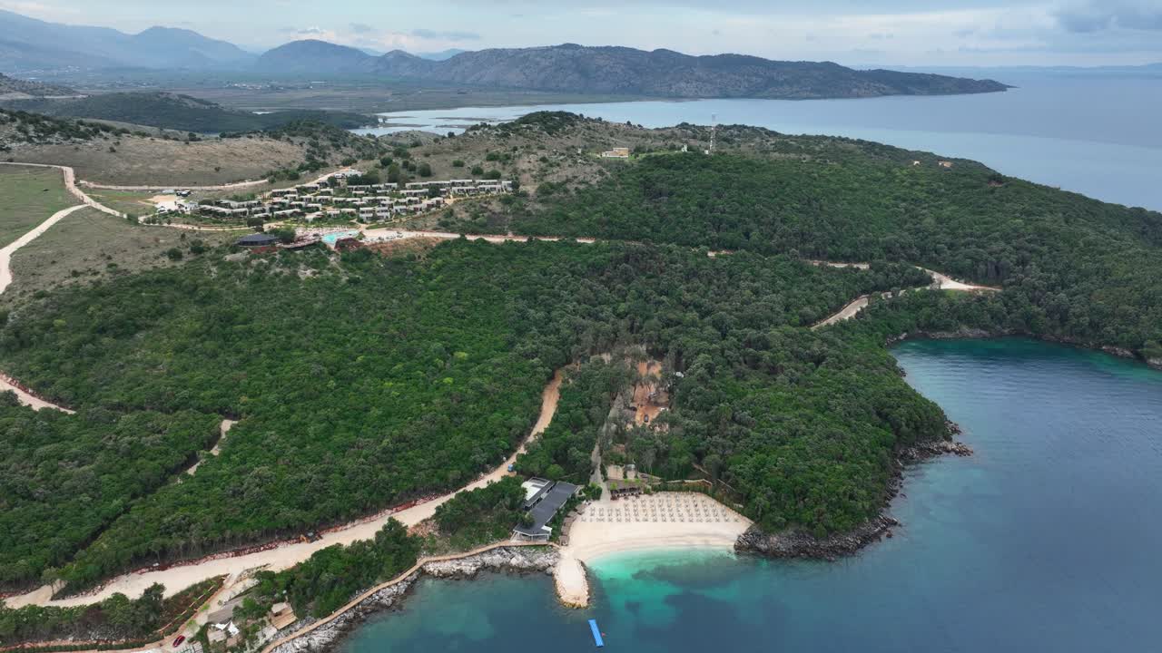Arameras Beach Resort, Ksamil, Albania - A Quiet Escape Between Forest, Clear Water, and Distant Mountain Views - Aerial Drone Shot