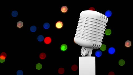 micrófono blanco retro contra manchas de luz coloridas contra un fondo negro