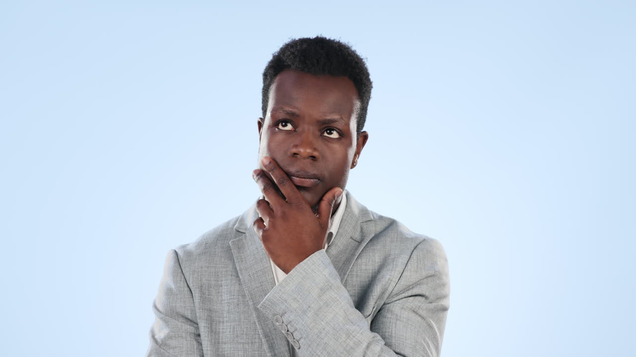 Thinking, idea and black man in studio