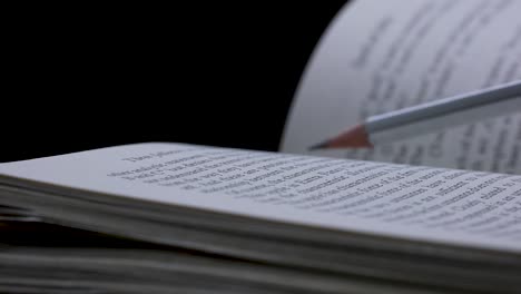 open book with pencil