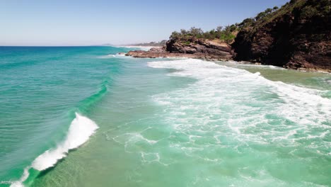 turquoise ocean water in noosa shire, queensland, australia - drone shot