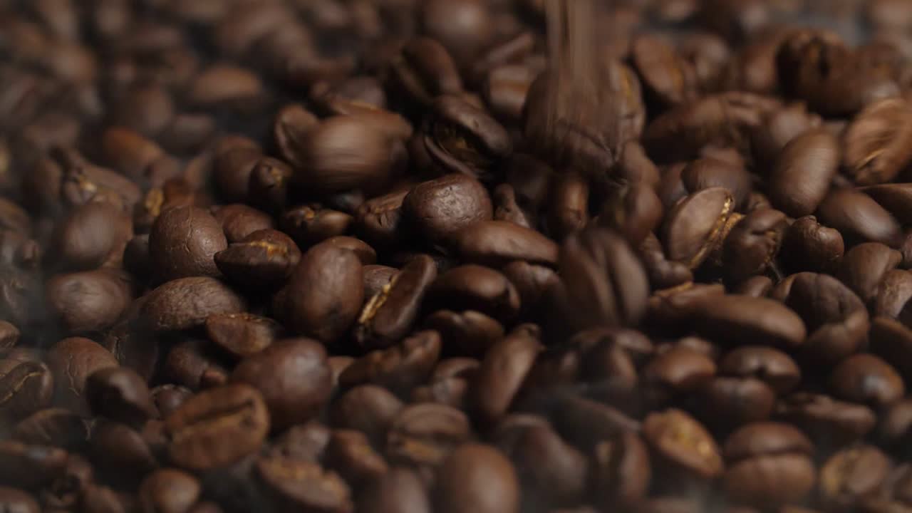Falling Roasted Coffee Beans With Smoke, Slow Motion