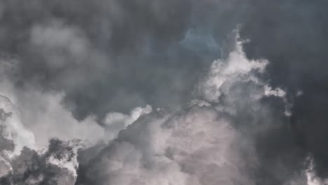 4k cloud with lightnings in dark sky