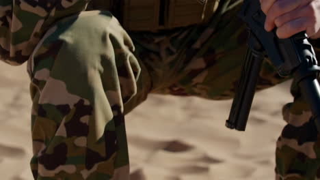 soldier in desert combat uniform