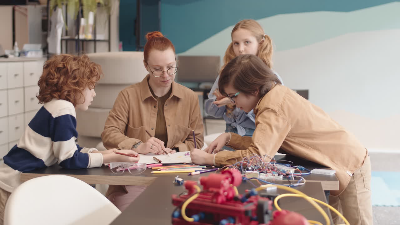 Teacher and Three Schoolchildren Drawing Robot Blueprint
