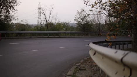 muscular man riding on a motorcycle on a turn clings to the asphalt, sparks fly