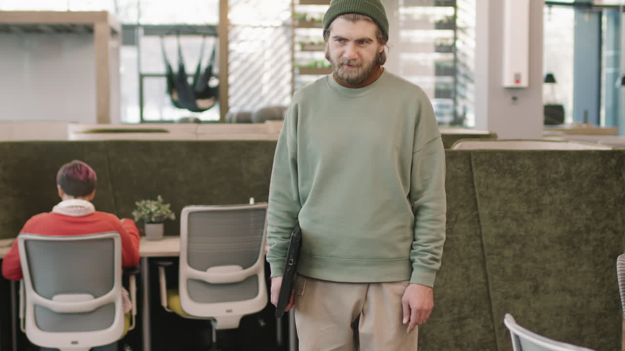 Male Executive of Start-Up Company Riding Hoverboard