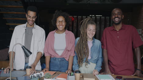 happy diverse group at a workplace