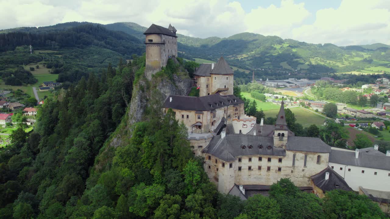 Aerial View of a Medieval Castle Perched on a Mountain