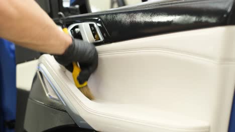 car interior detailing with a brush