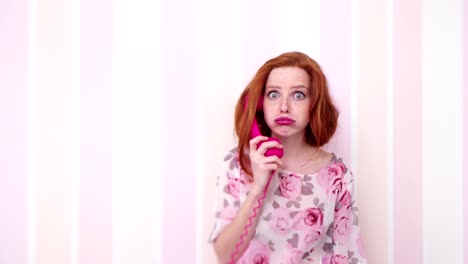 young woman talking on the telephone
