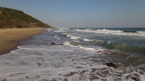 watching ocean waves on rock