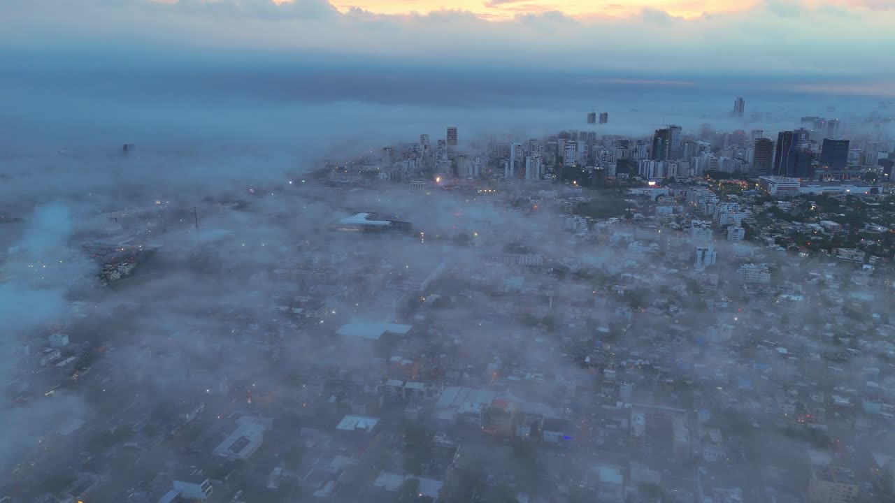 Misty Morning in Santo Domingo: Wide-Angle Aerial Views of the Dominican Capital with Winter Fog and Blurred Cityscape