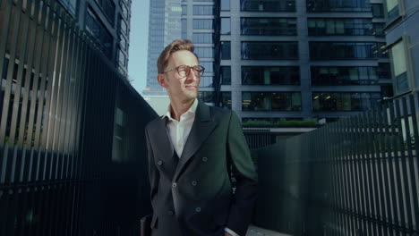 successful employee posing confident in modern office surroundings