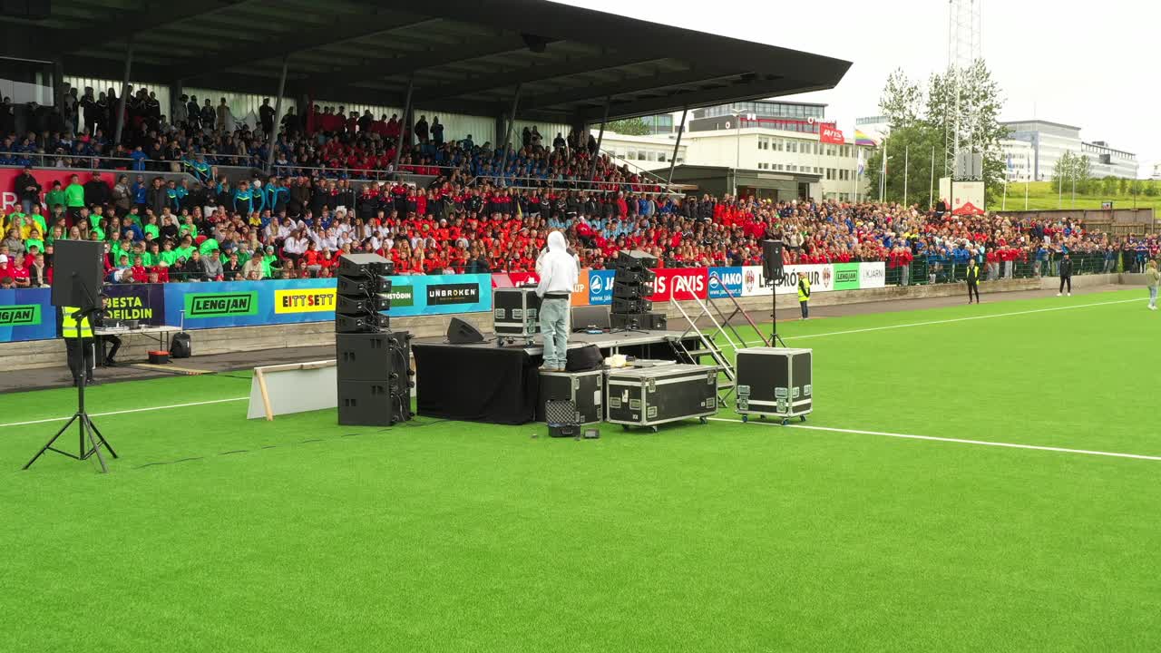 Audience cheering up in live musical concert at Laugardalsholl Sports Center and stadium, Rey Cup International