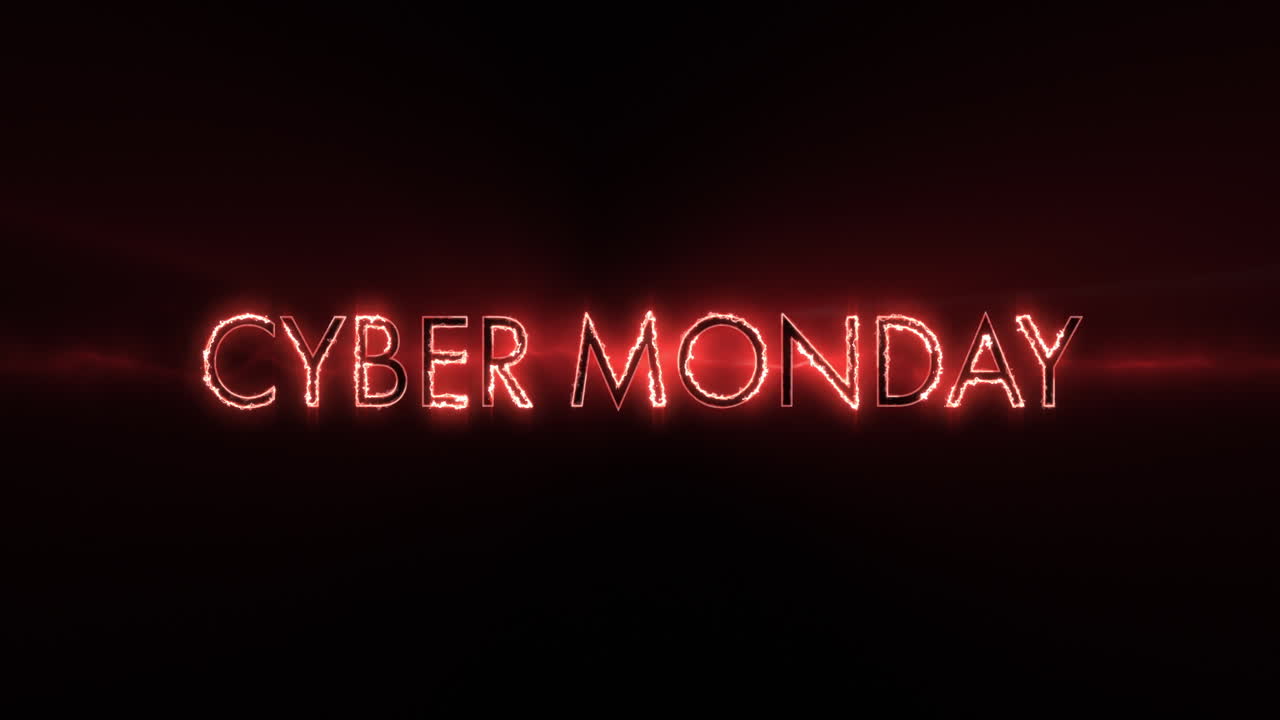 Neon red Cyber Monday text appearing against a black screen 4k