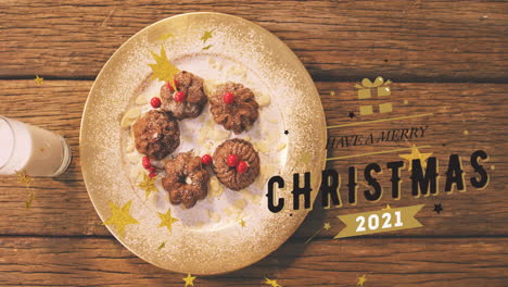 animación del texto de feliz navidad sobre las galletas de navidad