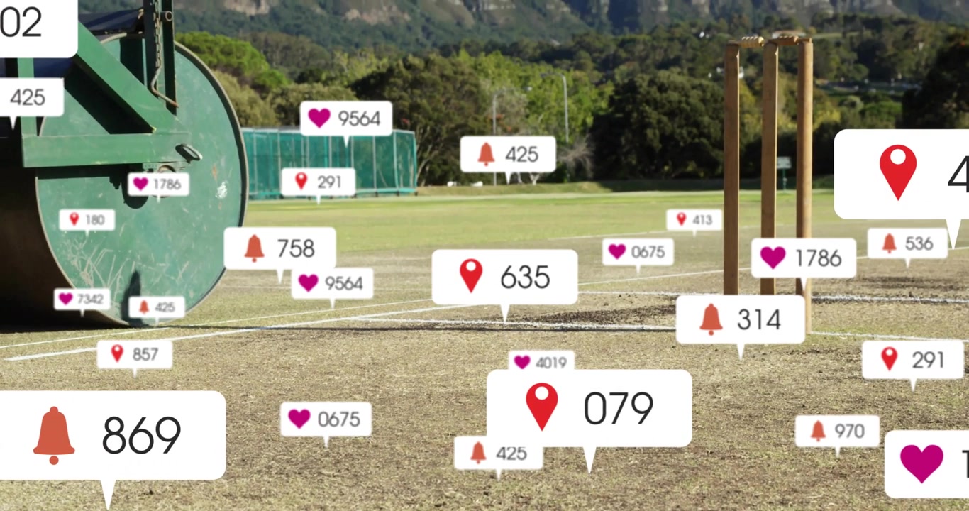 Animation of social media notifications over roller on sunny cricket pitch