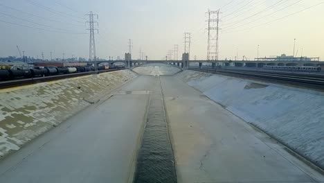 drone flight at low altitude over los angeles river