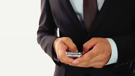 businessman using mobile phone for text messaging