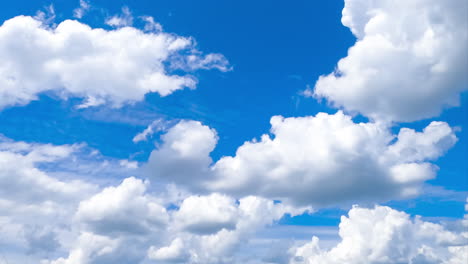 heavenly beautiful cumulus clouds transforming in the blue skies. light spindrift clouds at backdrop. timelapse.