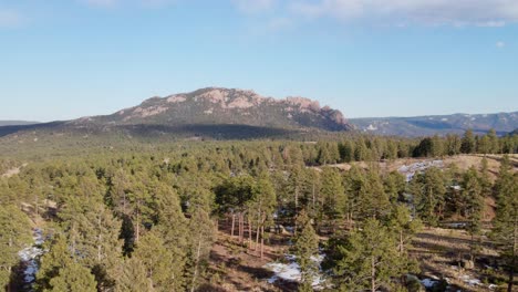 aerial drone view of the pike national forest and long scraggy mountain. trucking movement to the left. filmed in the rocky mountains of colorado.