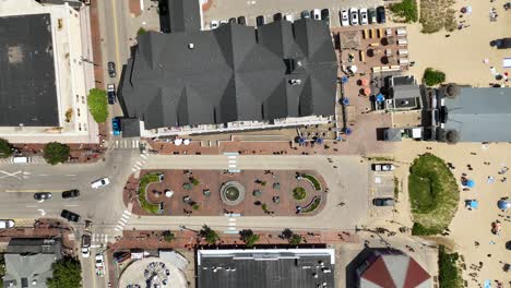 Overhead-drone-shot-of-the-Old-Orchard-Beach-downtown-and-beach-in-Maine