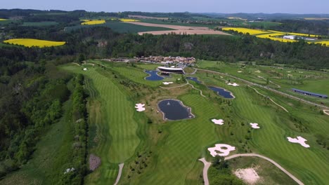 golf courses and ponds near kacov in czech republic, popular golfing area, panoramic aerial drone view