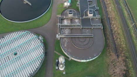 aerial of waste water flowing through aeration tank at sewage water treatment plant