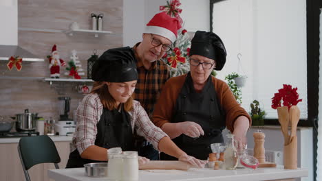 grandparents coffee grandchild making traditional christmas homemade cookies