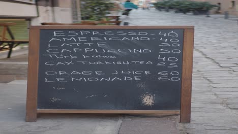 street cafe menu board in a city