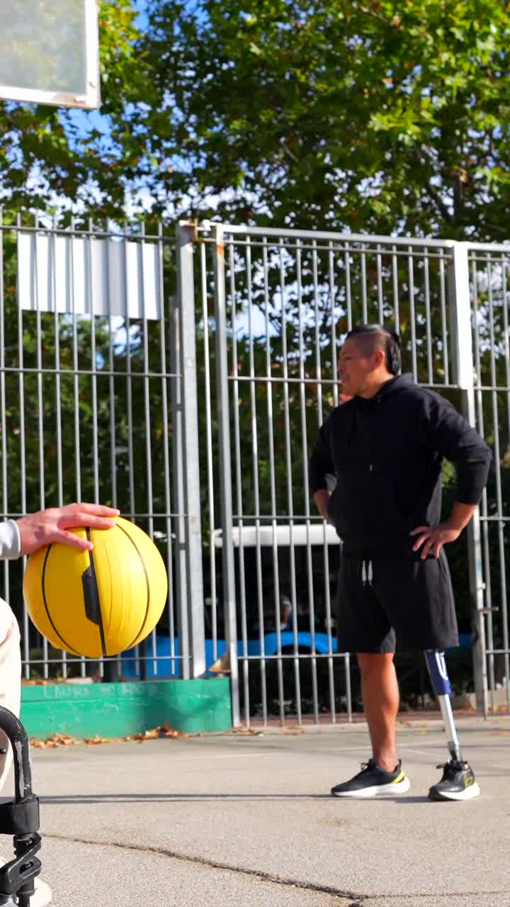 Adaptive basketball game with disabled athletes