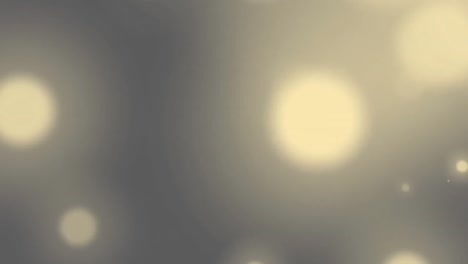 animation of falling spots of lights over grey background