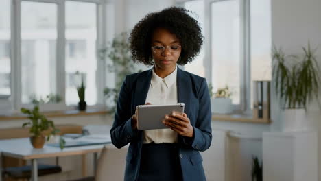 businesswoman using tablet in office