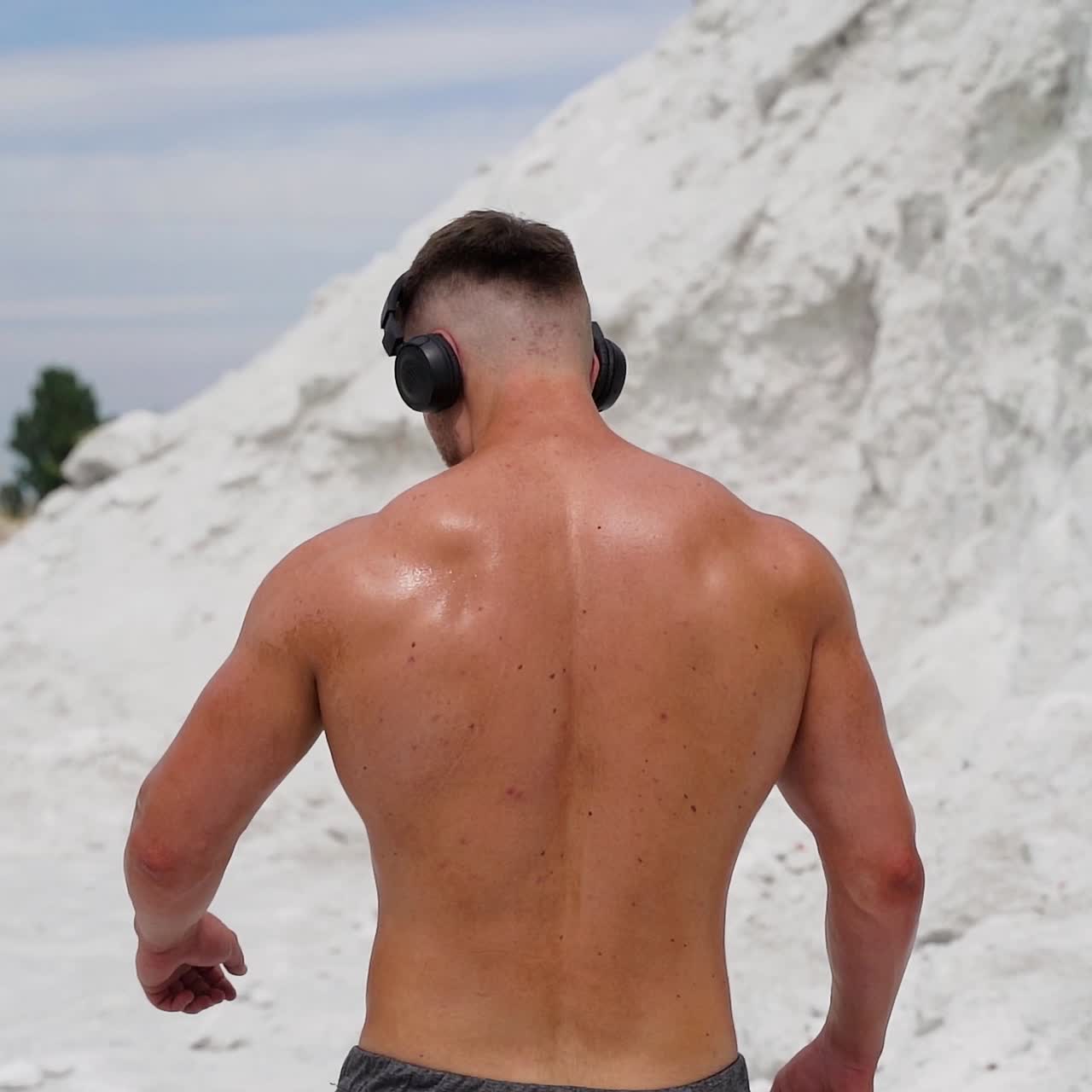 Sportsman listening music for workout