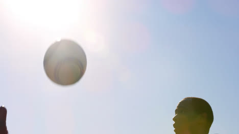 players practicing soccer in the field 4k