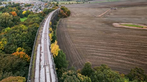 Drone-footage-of-the-exceptional-Penistone-Railway-Station-and-Viaduct-near-Barnsley,-South-Yorkshire