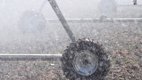 close up view of center pivot irrigation sprinkler system wheel